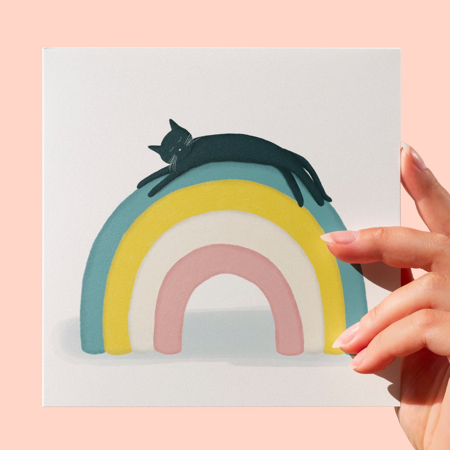 Cat on rainbow greeting card