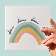 Load image into Gallery viewer, Rabbits over a rainbow greeting card
