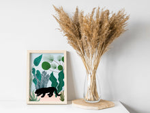 Load image into Gallery viewer, Print of a puma surrounded by plants 
