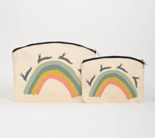 Load image into Gallery viewer, Leaping hares on a rainbow cosmetic bag
