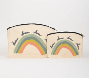 Leaping hares on a rainbow cosmetic bag