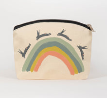 Load image into Gallery viewer, Leaping hares on a rainbow cosmetic bag
