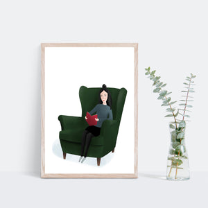 Print of a lady sitting in an arm chair reading 