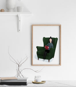 Print of a lady sitting in an arm chair reading 