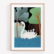 Load image into Gallery viewer, Print of a swan with her cygnets on her back on the water with trees in the background
