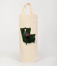 Load image into Gallery viewer, lady in chair reading bottle bag 
